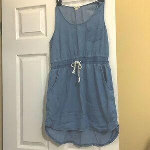 The brand is Timing size Large. It does run small. It’s very light denim.